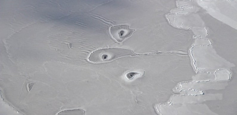 NASA Can’t Explain What Created These Ice Holes In The Arctic Sea